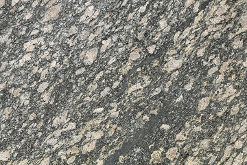 Texture of granite stone is yellow-green