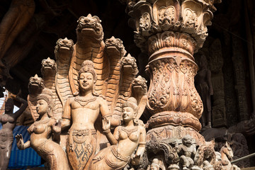 Details of Sanctuary of Truth temple (Prasat Satchatham),handmade reliefs and sculptures, Pattaya, Thailand
