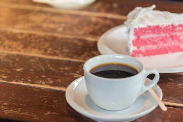 A cup of  coffee and cake.