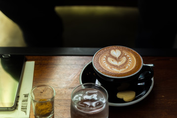A cup of cappuccino coffee in morning. A cup of coffee. A cup of  Americano coffee. Americano is a...