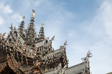 Naklejka premium Details of Sanctuary of Truth temple (Prasat Satchatham),handmade reliefs and sculptures, Pattaya, Thailand