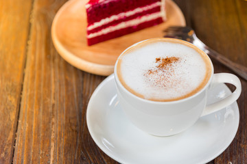 A cup of  coffee and cake.