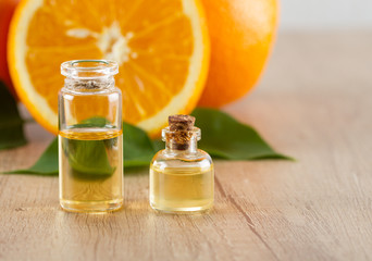 Orange aroma oil and fresh orange 