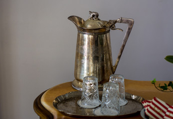 June 25, 2016, Splendor Hotel, Istanbul, Prince Island,Turkey: Antique silver pitcher and crystal glasses on a table