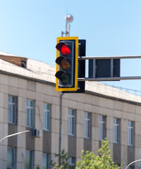 Traffic light on the road in the city