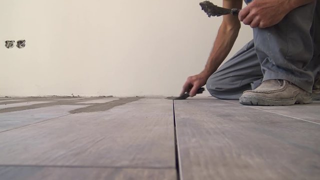 Tile grouting