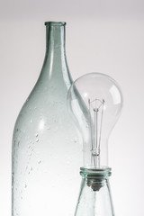 abstract still life clear glass vintage bottle and lamp