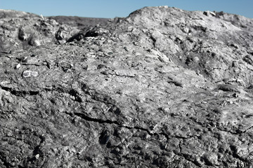 waste of the processing of oil shale - shale sand shot close up and looks like on the surface of the moon.