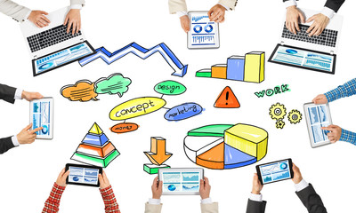 Top view of businesspeople sitting at table and using gadgets