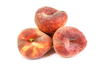 Chinese flat peaches cut out on white background