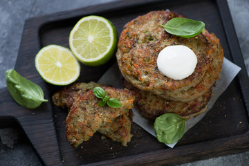 Fried vegetable cutlets with broccoli, close-up, high angle view