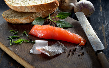 fresh  salmon on wooden cutting board