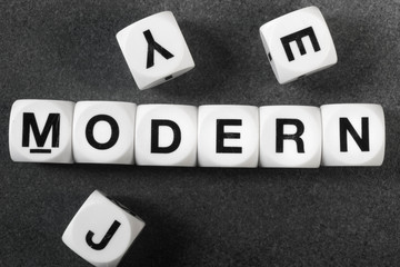 Obraz premium word modern on toy cubes