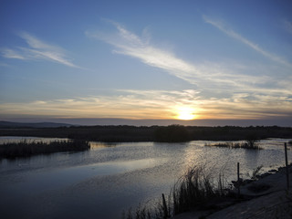 Breathtaking sunset in Danube Delta, Romania, in a summer day