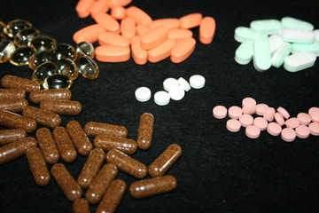 numerous legal drugs on black background