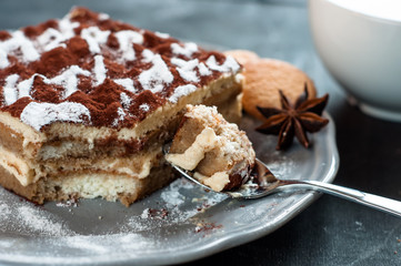 Tiramisu cake decorated with the words Happy Birthday