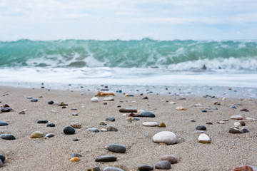 Fototapeta na wymiar pebbles on a beach of Mediterranean Sea