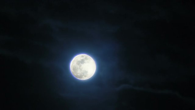 Moon shining at night when witches, zombies, vampires and werewolves come out