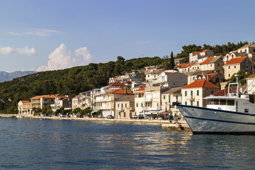 Fototapeta na wymiar Ships in harbor of fisherman and tourist village Povlja on north east on Island Brac in Croatia