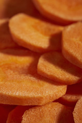 sliced raw carrots, sometimes called carrot coins