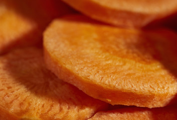 sliced raw carrots, sometimes called carrot coins