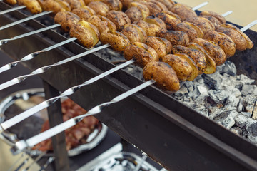 potato . Grilled potatoes in the open air