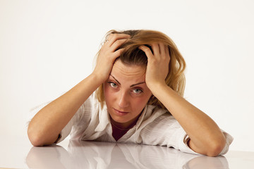 Portrait of exhausted and tired business woman in the office (Depression, sadness, problems,...