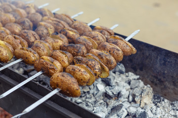 potato . Grilled potatoes in the open air