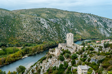 Fototapeta na wymiar View on the river at The Old Town of Pocitelj, Bosnia and Hezegovina