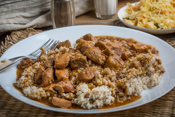 Barley groats with stewed meat.