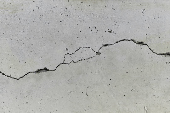 betonwand mit langem riss hintergrund textur