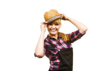 Woman wearing sun hat posing and smiling