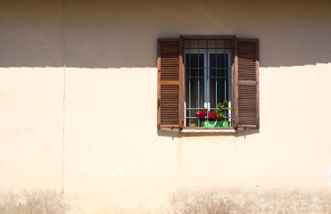 Fragment of vintage facade with window. Tel Aviv, Israel.