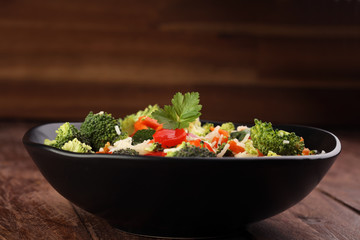 Colorful rice and vegetable salad - fresh mixed colorful healthy vegetarian food