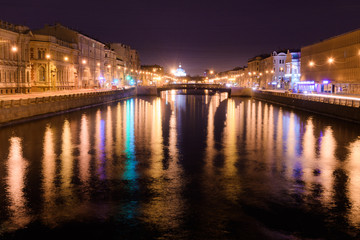 View of Lomonosov bridge across the Fontanka river, Saint-Petersburg, at night