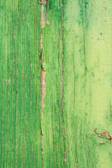 aged wooden plank with decayed green paint texture