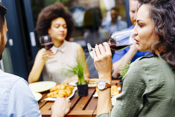 Young people enjoy the food and drink and have great fun outdoors