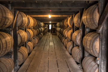 Looking Down Walkway in Bourbon Aging Warehouse - obrazy, fototapety, plakaty