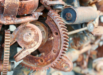 Old rusty gears and industrial parts