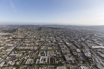 Aerial view of Glendale California neighborhoods with Los Angeles in background.