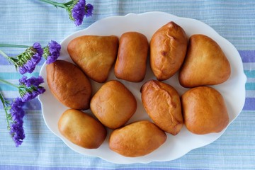 Delicious fresh hotcakes and lavender flowers on a napkin 
