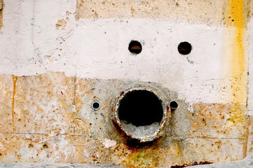Faces in Places: Rusty Pipe