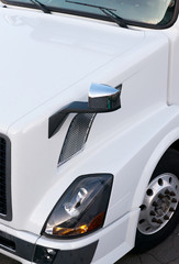 Details of white modern semi truck