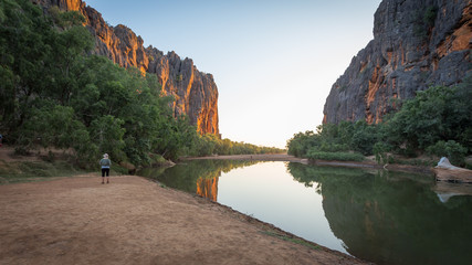 Fototapeta premium The Lennard River carves a stunning canyon through the Napier Range at Windjana Gorge, Kimberley Region, Western Australia. Pools in the river provide a habitat for dozens of freshwater crocodiles.