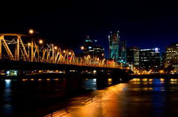 Fototapeta na wymiar Drawbridge in the night lights of Portland downtown