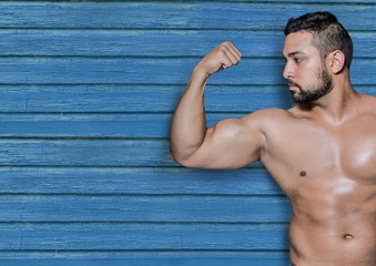 fitness man with blue wood background