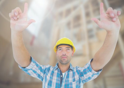 Construction Worker with hands up in air