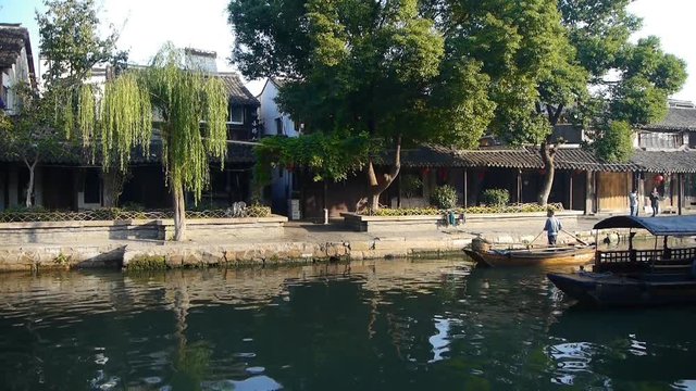 Traditional Chinese houses in XiTang Water Town,fishermen boating,shanghai,China.