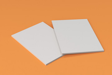 Two blank white closed brochure mock-up on orange background