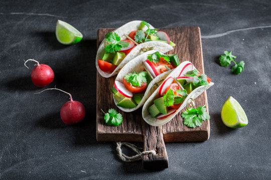Mexican tacos with cherry tomatoes and radish